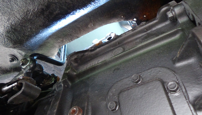 Here’s where the transfer case shifter pokes through the tub and into the interior.
